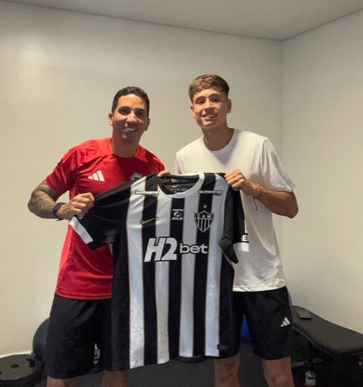 Hugo Araújo com Ivan Román